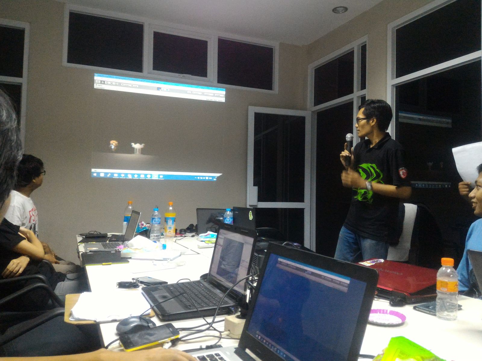 Pitching Lightbringer to the room, game running live on the projector